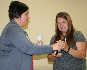 Karen Hubl receives the DAISY Award.