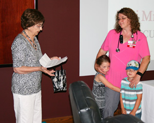 Lori's nomination letter being read.